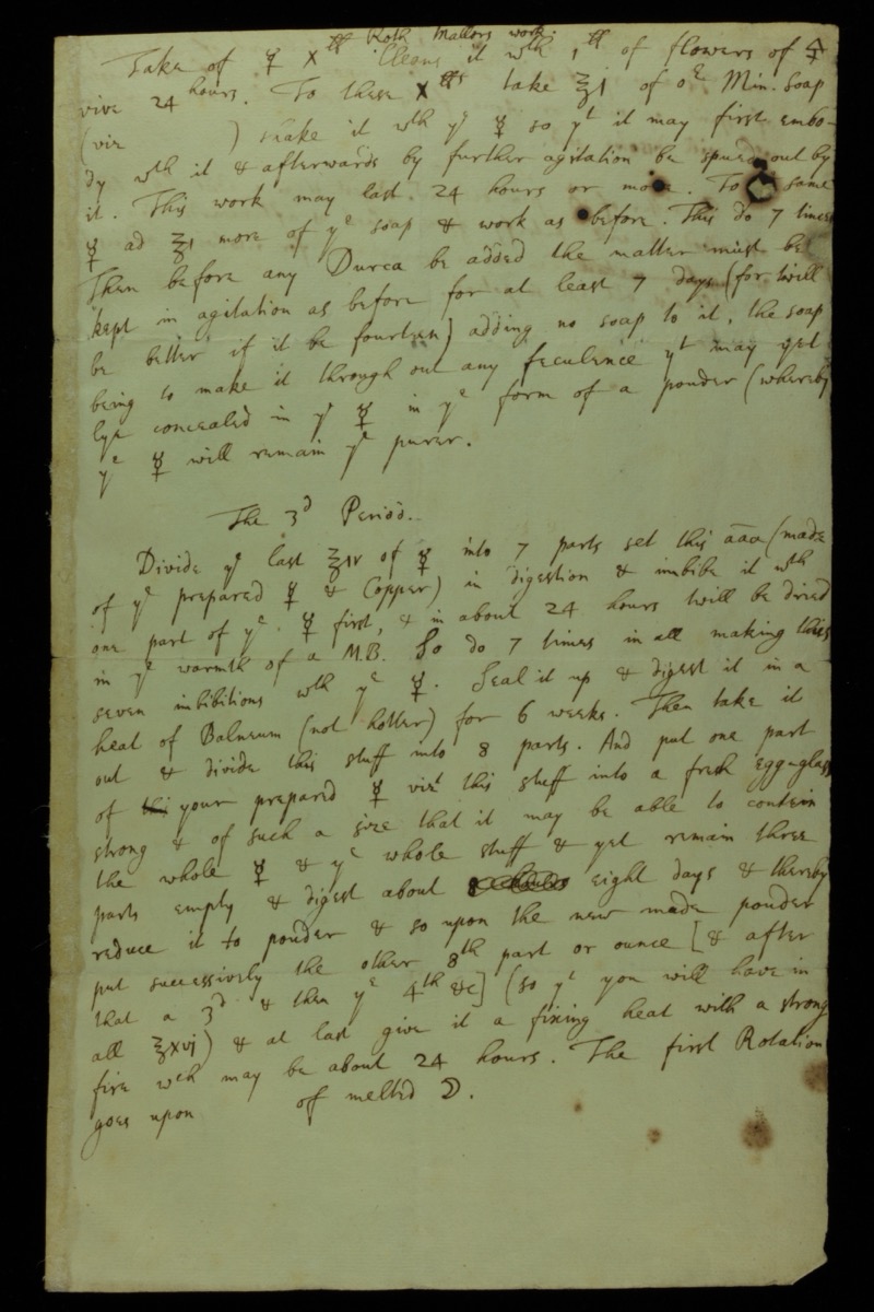 Photograph of a page of dense handwriting in brown ink, Newton's alchemical notes.